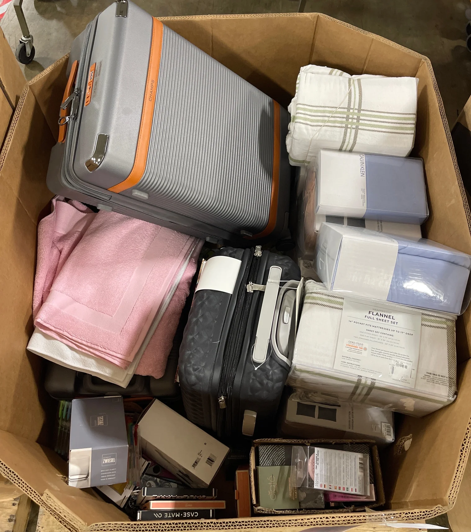 Assorted Merchandise suitcase